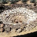 First, the Agave fruit is baked in this outdoor stone oven.