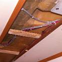 Here we see the overhead wiring now pulled and secured.    The aluminum plate is a backing plate for the traveller mount above.  The original traveller arrangement  leaked, into the cabin and into the deck! and so a serious project was required to fix this, interrupting the wiring project.